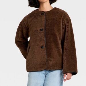 Faux sherling coat
Never worn